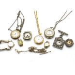 A small group of lady's watches and watch chains, including a thin yellow metal watch chain marked