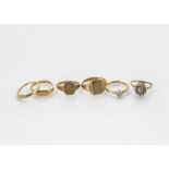 A group of four gold rings, including two gentleman's signet rings in 9ct gold, a 9ct gold band,