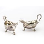 A pair of 1960s silver sauce boats by A C & S Ltd, in the Georgian taste, on three pad shell feet,