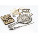 A collection of costume jewellery, including a Scottish silver Celtic brooch, an amber white metal