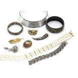 A large quantity of costume jewellery, including bangles, necklaces, hand painted Russian brooch etc