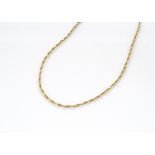 An 18ct gold fancy link chain, marked 750 to clasp, 55cm long, 9g