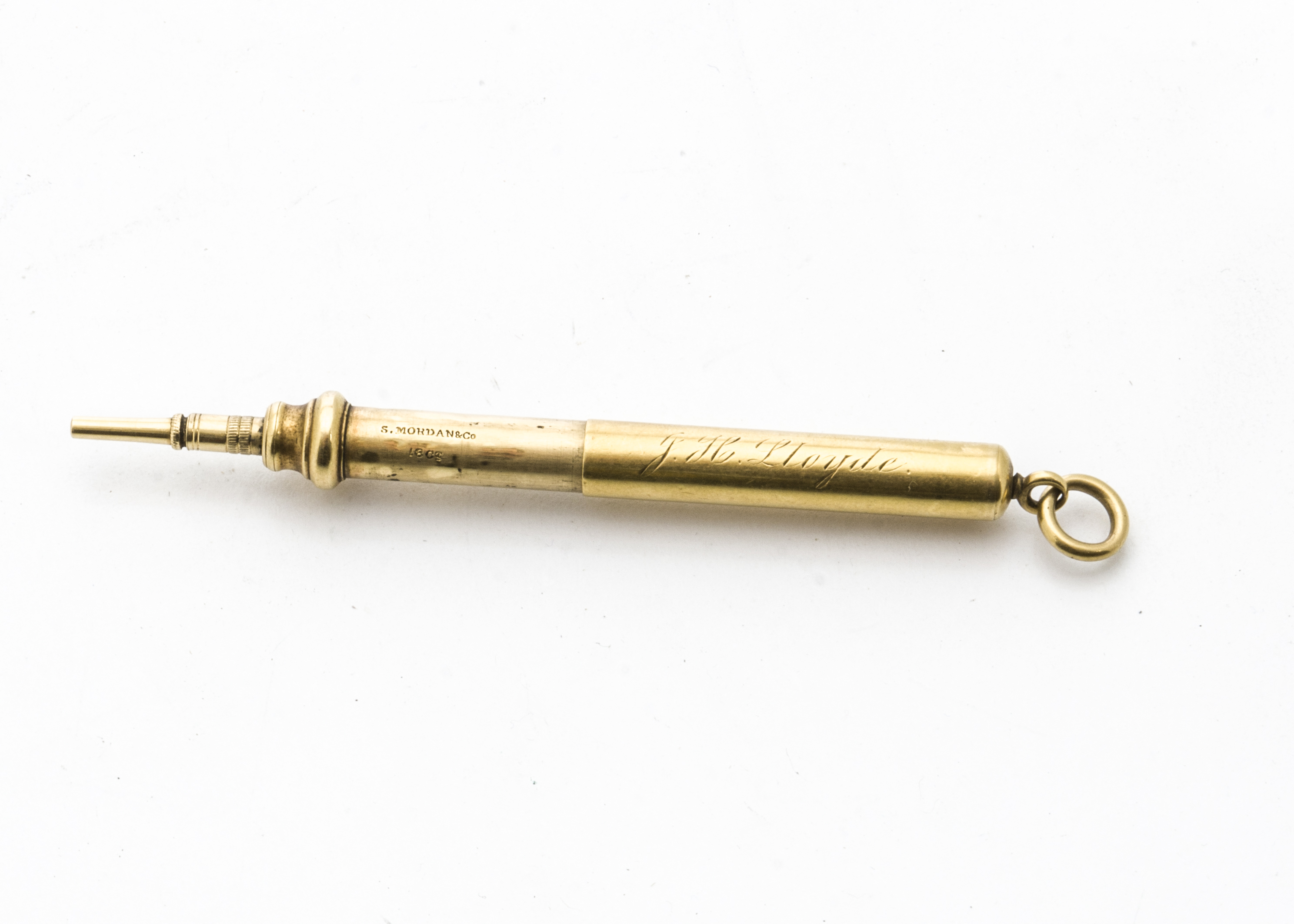 A late Victorian or Edwardian 18ct gold fob pencil by S. Mordan & Co, engraved J.H. Lloyde, 15.5g,