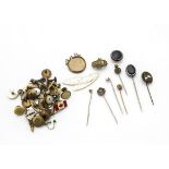 A small quantity of gold, silver and base metal stick pins and buttons, including two agate