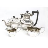 A George V silver four piece tea set by BG&S, Birmingham 1929, comprising teapot, sugar basin,