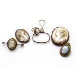A collection of cameo jewellery, including two shell carved brooches, a gilt metal and composite