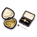 An Edwardian 9ct gold Mizpah bar brooch, centred with heart design, a 9ct gold and paste set bar