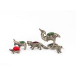 Four 20th Century silver animal pin cushions, including a larger emu or cassowary type bird, a