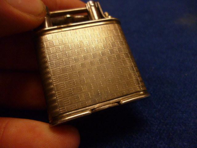 A 1920s silver cigarette lighter by Alfred Dunhill, in box, together with a similar aged 9ct gold - Image 5 of 7