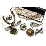 A collection of costume jewellery, including beads, brooches, necklaces etc together with a George V
