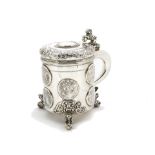 An interesting late 18th Century Danish silver tankard, three lion and ball supports with raised and