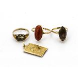 A continental yellow metal and coral dress ring, ring size W, 3.3g together with two 9ct gold