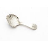 A George III silver tea caddy spoon by Christian Ker Reid I, the shell shaped bowl with rounded