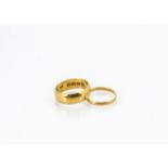 Two 22ct gold wedding bands, one with D shaped outline and wide band, marked 1915, ring size N 1/