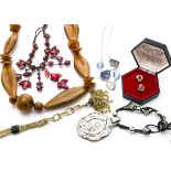 A quantity of costume jewels, including a Trifari gilt metal necklace, a silver and cultured pearl