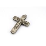 An early 19th Century silver hinged Arma Christi crucifix pendant, the front with Jesus Christ