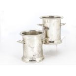 A pair of George V silver wine bottle holders by Barker Ellis Silver Co, having feathered rims,