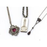 A silver ingot and chain, with St Christopher symbol, a garnet drop pendant on white metal chain and