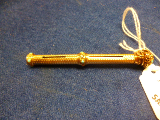 A Victorian gold retractable pencil, with engine turned body, possibly 15ct or 18ct gold, chased - Image 6 of 6