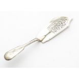 A Victorian silver fish slice by Elizabeth Eaton, fiddle and thread with pierced blade, London 1865