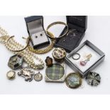 A quantity of silver set jewellery, including tiger's eye rings, art deco style synthetic ruby dress