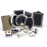 Five Edwardian and modern silver photograph frames and other items, another marked Birks Sterling,