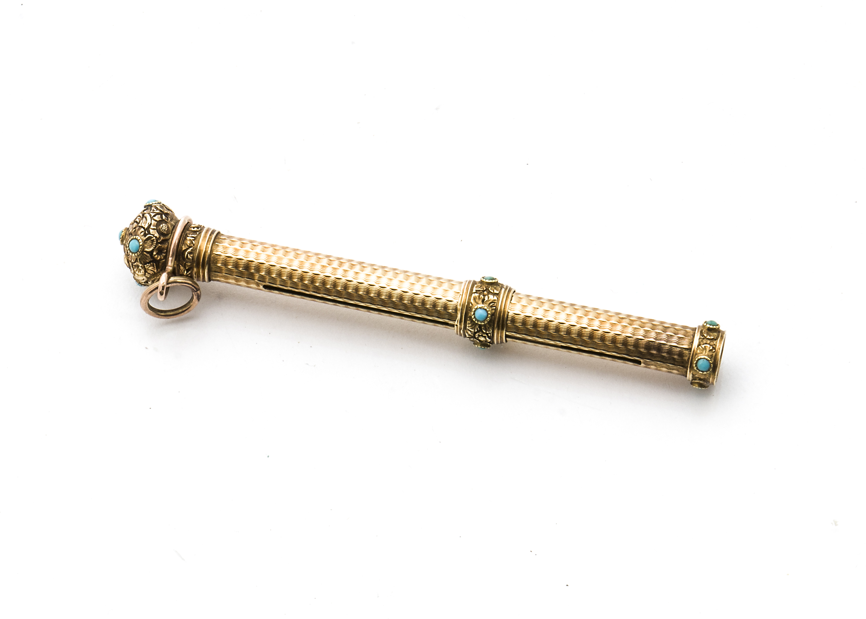 A Victorian gold retractable pencil, with engine turned body, possibly 15ct or 18ct gold, chased