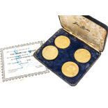 A set of four 1970s silver gilt The Churchill Medals from John Pinches, numbered 519 to certificate,