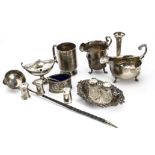 A collection of 19th and 20th Century silver items, including a Christening tankard, sauceboat, milk