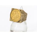 A George V full sovereign in textured, heavy 9ct gold mount ring, ring size U 1/2, 27g