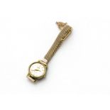 A c1960s Omega lady's wristwatch, 20mm gold plated fronted case, silvered dial with batons,