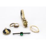 A small quantity of gold jewellery, including a 9ct gold paste set eternity ring, a three stone