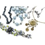 A large quantity of costume jewellery, including beads, simulated pearls and other items