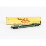 A Tri-ang TT Gauge uncommon green T173 Bogie Well Wagon, in original box, E, box G-VG