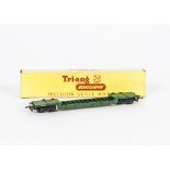 A Tri-ang TT Gauge uncommon green T173 Bogie Well Wagon, in original box, E, box VG