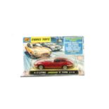 A Corgi Toys 335 Jaguar 4.2 Litre E-Type, dark red body, black interior, spoked wheels, in