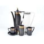 A Portmeirion 'Greek Key' pattern coffee set designed by Susan Williams Ellis, in black and gold,