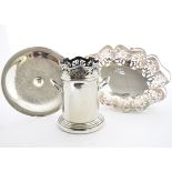 A 20th Century silver plated bottle sleeve, with two handles and pierced decoration, 18 cm high,