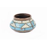 An 18th Century Middle-Eastern copper bowl with blue and white enamel decoration, tapering form,