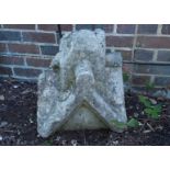 A 19th Century worked stone gate post capital, probably from a church