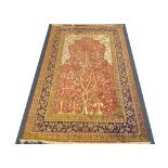 A brushed cotton Persian rug, tree of life design on terracotta ground, ivory foliate borders,