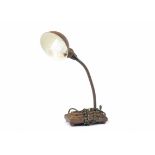 An Art Deco adjustable desk lamp, metal shade, metal and wooden stepped base, base 21 cm wide