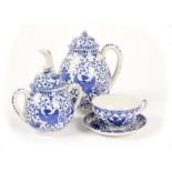 A 20th Century Japanese porcelain part tea service, blue and white phoenix and scroll decoration,