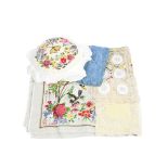 A large quantity to 20th Century linen and fabrics, including tablecloths, napkins, doilies and