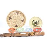 A collection of modern Shona items, including baskets, walking stick, pictures and other items