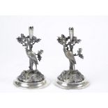 A pair of 19th Century silver plated candlesticks modelled as cranes on a rock by Deykin & Sons,