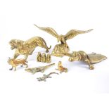 A collection of brass models of animals, including a bootjack modelled as a beetle, 25 cm long;