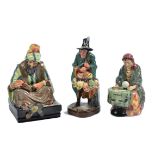 Three Royal Doulton figures, including the 'Fortune Teller' HN 2159, 'Cobbler' HN 1706 and 'The Mask