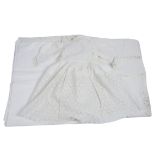 A large quantity of 20th Century linen, including doilies, tablecloths, napkins, children's clothing