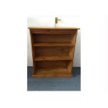 A waxed pine bookcase, plinth base, two adjustable shelves, 83 cm wide x 30 cm deep x 97 cm high